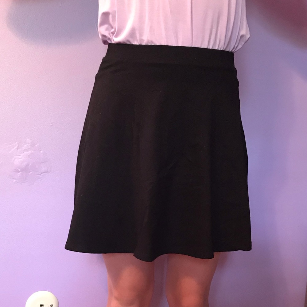 Black skirt fits size xs-s